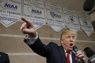 Republican U.S. presidential candidate Donald Trump addresses caucus goers as he visits a Nevada Rep