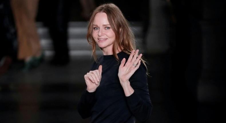 British fashion designer Stella McCartney acknowledges the audience at the end of her women's Fall-Winter 2017-2018 ready-to-wear collection fashion show