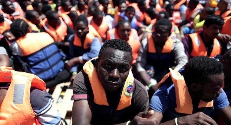 Migrants are seen aboard of Migrant Offshore Aid Station (MOAS) rescue vessel Phoenix during a rescue operations in the international waters between Malta and Libya on August 10,2016.  REUTERS/Yara Nardi