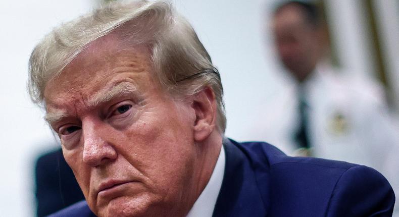 Donald Trump sitting at the defense table on his last day attending his civil fraud trial in New York.Mike Segar-Pool/Getty Images