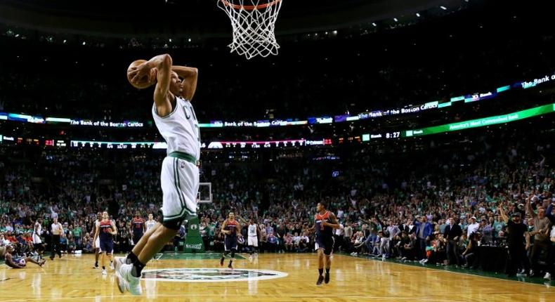 Avery Bradley of the Boston Celtics dunks against the Washington Wizards in Game Five of the NBA Eastern Conference semi-finals, at TD Garden in Boston, Massachusetts, on May 10, 2017