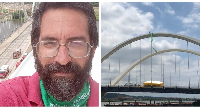 A close up Guido Reichstadter (L) as he sits on the Douglass Frederick Memorial Bridge. He can be seen waving a flag on the right-hand picture.