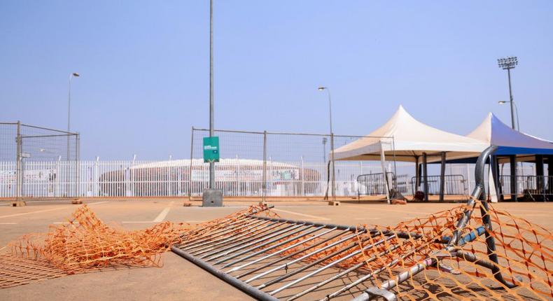 An overturned barrier at the scene of Monday's tragic crush at Yaounde's Olembe stadium Creator: Kenzo TRIBOUILLARD