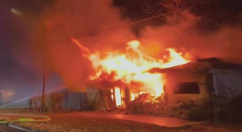 A photo of a building on fire