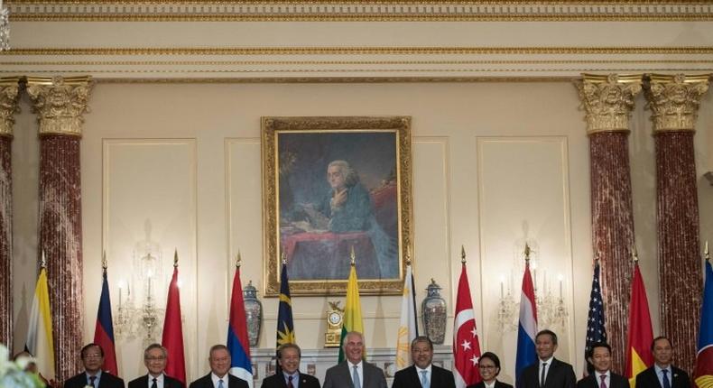 US Secretary of State Rex Tillerson poses with ASEAN foreign ministers prior to a luncheon at the State Department in Washington, DC, on May 4, 2017