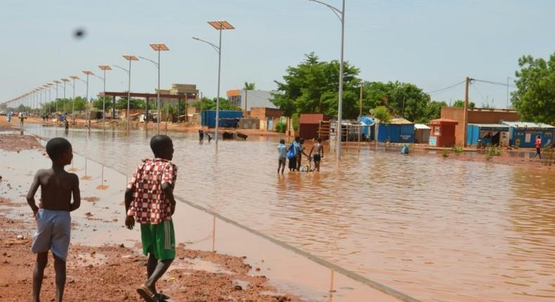 The flooding in Niger's capital Niamey caused houses to collapse, killing 14 people, most of them children