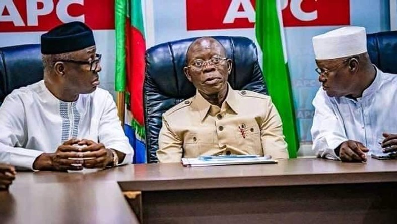 APC national chairman, Adams Oshiomhole, flanked by party men. [The Cable] 