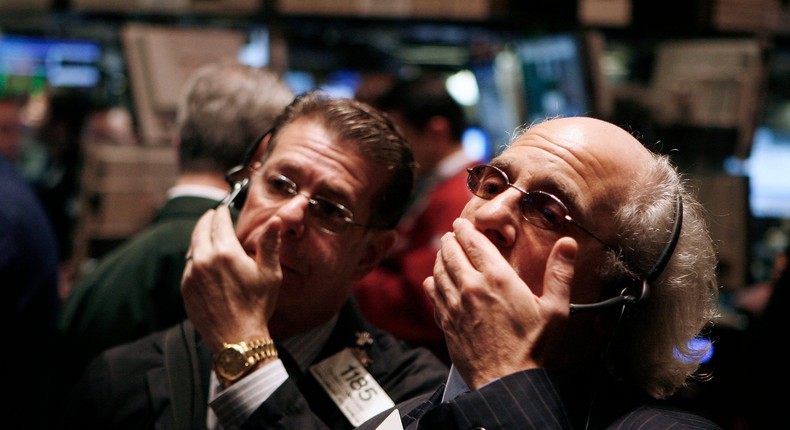 Traders work on the floor of the New York Stock Exchange in New York on November 25, 2008.REUTERS/Lucas Jackson