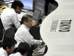 Giełdy w Azji czekają na rozwój sytuacji w Grecji