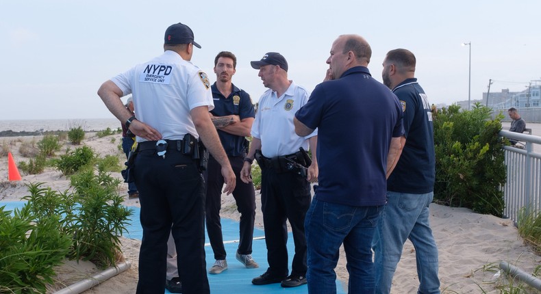 Police respond to Rockaway Beach at Beach 59th Street in Queens, New York City after a swimmer was attacked by a shark.Gardiner Anderson/New York Daily News/Tribune News Service via Getty Images