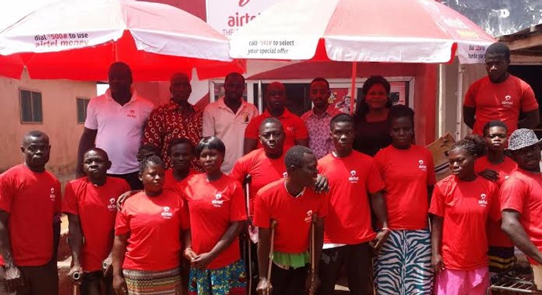 Some of the beneficiaries at the presentation with some dignitaries who graced the occasion in a group photograph as Airtel donated to the challenged