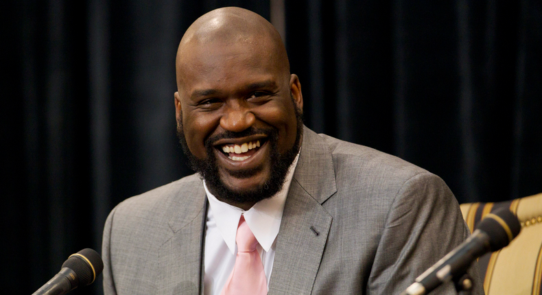 FILE PHOTO: Shaquille O'Neal laughs while telling a story during his announcement of his retirement from the National Basketball Association (NBA) at a news conference at his home in Windermere, Florida June 3, 2011. REUTERS/Scott Audette