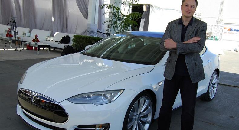 Tesla CEO Elon Musk with the Model S.