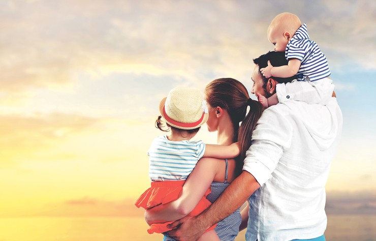 stock-photo-happy-family-of-father-mother-and-two-children-baby-son-and-daughter-on-the-beach-at-sunset-436882234