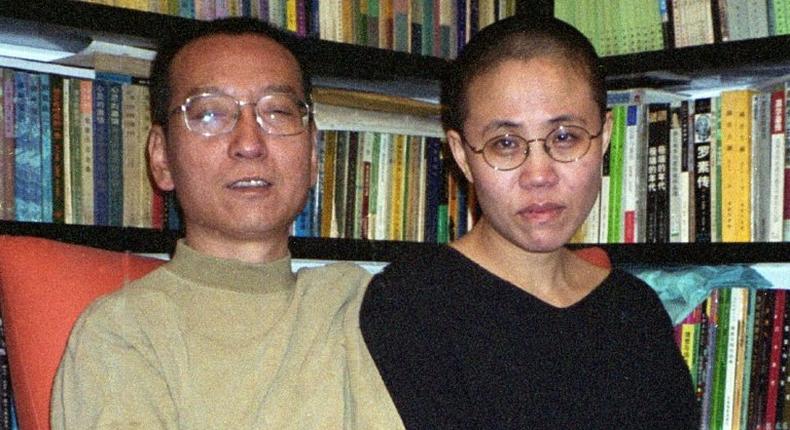 Chinese dissident and Nobel Peace laureate Liu Xiaobo (L) and his wife Liu Xia in a 2002 picture before his detention in 2008