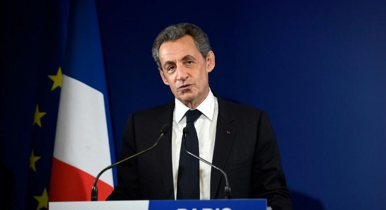 Former French president Nicolas Sarkozy delivers a speech to concede defeat in the first round of the rightwing presidential primary, at his campaign headquarters on November 20, 2016 in Paris