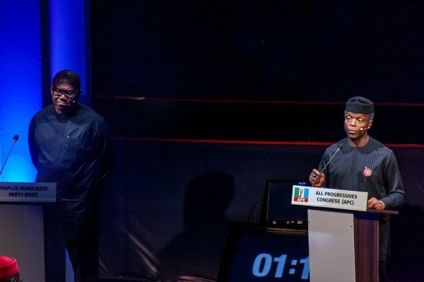 Vice President, Yemi Osinbajo (right), at the Vice Presidential Debate with vice presidential candidate of the People's Democratic Party (PDP), Peter Obi (left) --ChannelsTV 