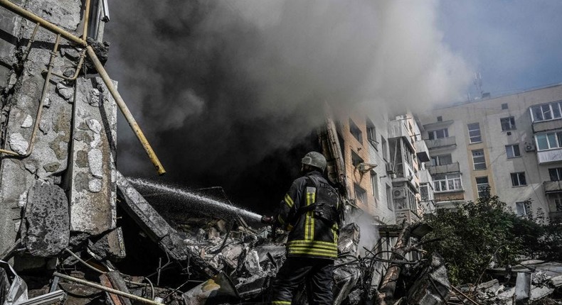 A firefighter extinguishes a fire after a flat was hit by a missile strike in Bakhmut, Donetsk region, on September 15, 2022.JUAN BARRETO/AFP via Getty Images