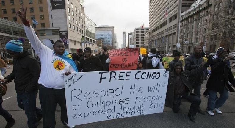 Protesters march up a downtown street during protest against a past presidential election in the Democratic Republic of the Congo, in a file photo.  REUTERS/Mark Blinch