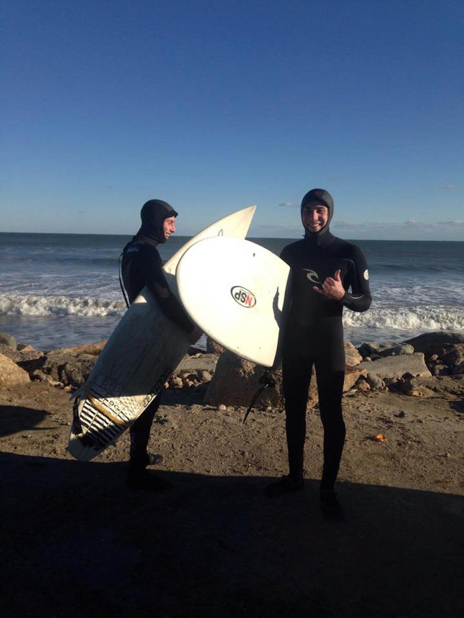 Me, surfing with my brother. It's hard to text in the ocean, though I did Instagram this picture.