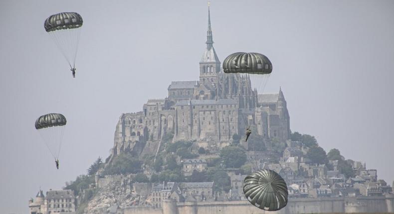 .S. Army Soldiers assigned to the 10th Special Forces Group (Airborne) conduct an airborne operation near the island of Mont Saint Michel, Avranches, France on May 18, 2019.