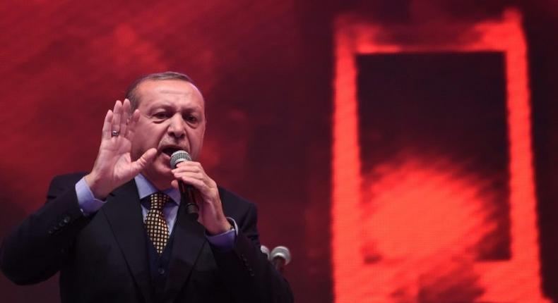 Turkish President Recep Tayyip Erdogan gives a speech on April 12, 2017 in Istanbul, pushing for a yes vote in the upcoming referendum on whether to change the current parliamentary system into an executive presidency