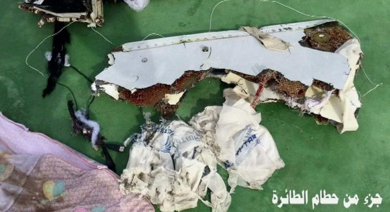 Recovered debris of the EgyptAir jet that crashed in the Mediterranean Sea is seen with the Arabic caption part of plane wreckage in this still image taken from video on May 21, 2016. 
