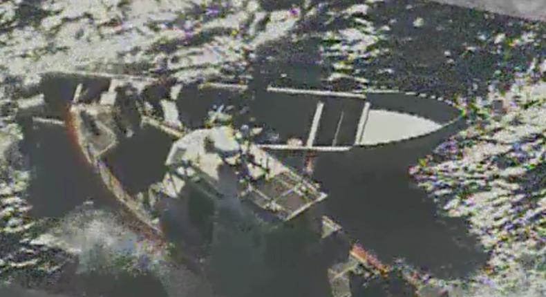 A boarding crew from the US Coast Guard cutter Stratton boards a suspected smuggling vessel in the Pacific Ocean, February 12, 2017.