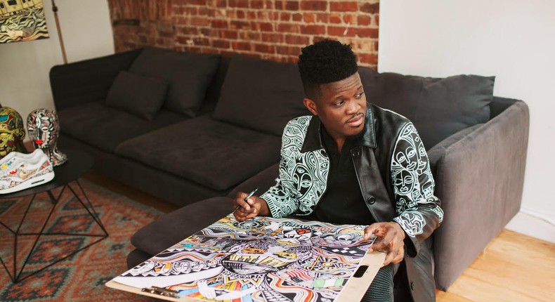 Laolu Senbanjo in New York working on a piece 