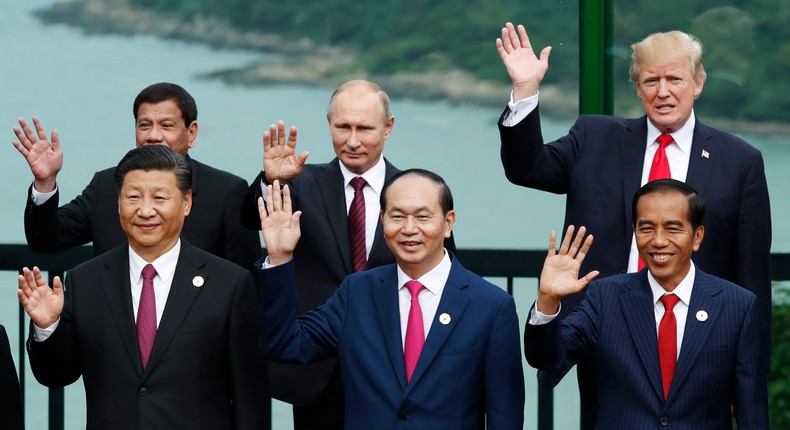 World leaders and then-President Donald Trump pose during the family photo during the Asia-Pacific Economic Cooperation leaders' summit in 2017.JORGE SILVA/AFP via Getty Images