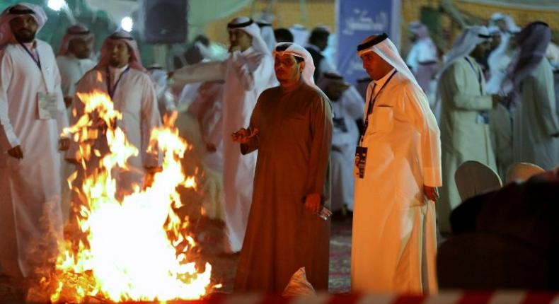 Kuwaitis attend an election campaign meeting for the upcoming parliamentary election, in Kuwait City