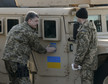 UKRAINE USA AID (Supplying the first part of American HMMWV military vehicles to Ukraine.)