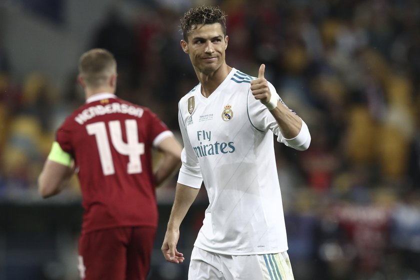 FILE PHOTO: Real Madrid's Cristiano Ronaldo celebrates after winning the Champions League in Kiev, U