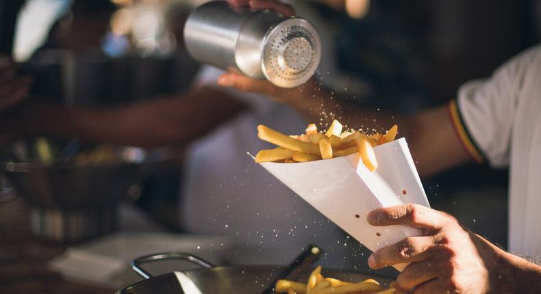 Adding table salt to food