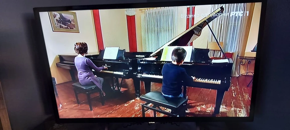 Marko sa profesorkom klavira