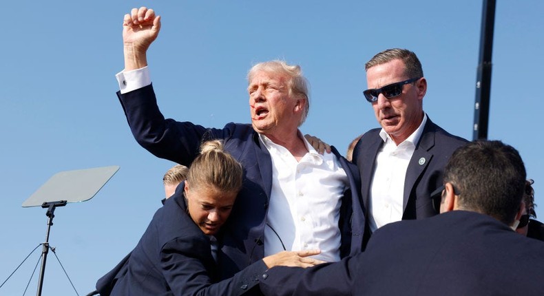 Secret Service agents rushing former President Donald Trump offstage during a rally in Butler, Pennsylvania.Anna Moneymaker/Getty Images