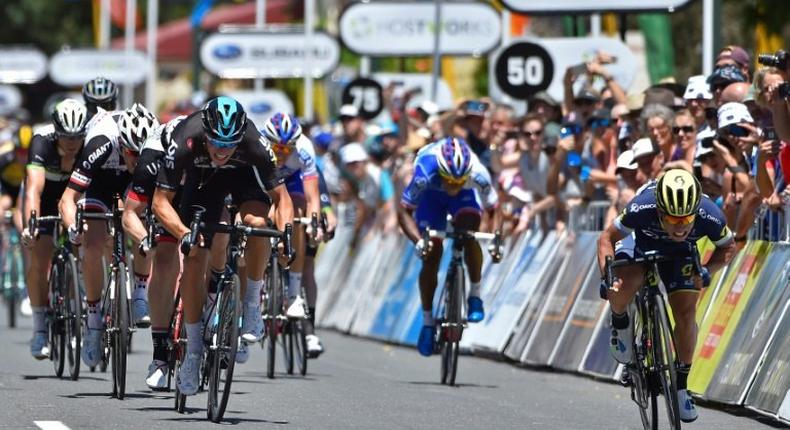 Australia's Caleb Ewan (R) of Orica-Scott team finishes ahead of Team Sky's Dutch cyclist Danny Van Poppel (front L) in the first stage of the Tour Down Under, from Adelaide to Tanunda, on January 17, 2017