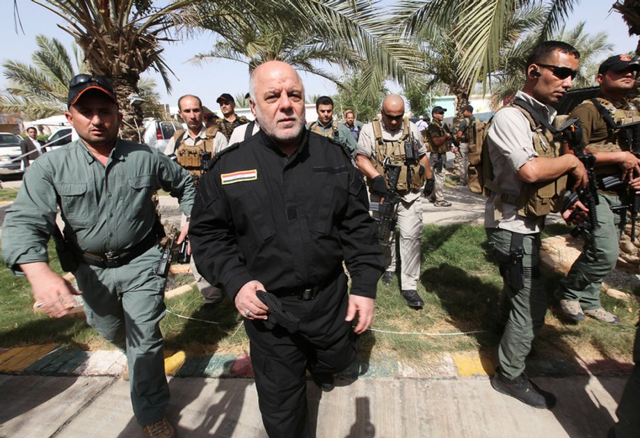 Iraqi Prime Minister Haider al-Abadi visiting an Iraqi army base in Camp Tariq near Fallujah, Iraq, on June 1.