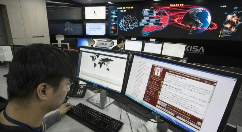 Staff monitor the spread of ransomware cyber-attacks at the Korea Internet and Security Agency in Seoul