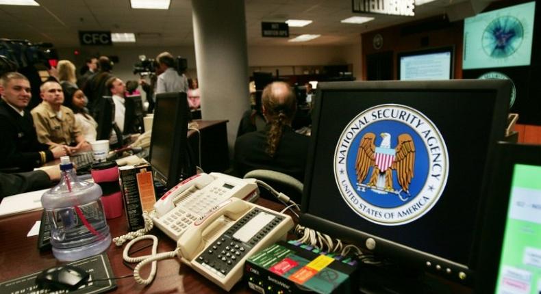 A computer workstation bearing the National Security Agency (NSA) logo is seen inside the Threat Operations Center at Fort Meade, Maryland