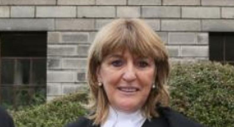 Justice Miriam Walsh