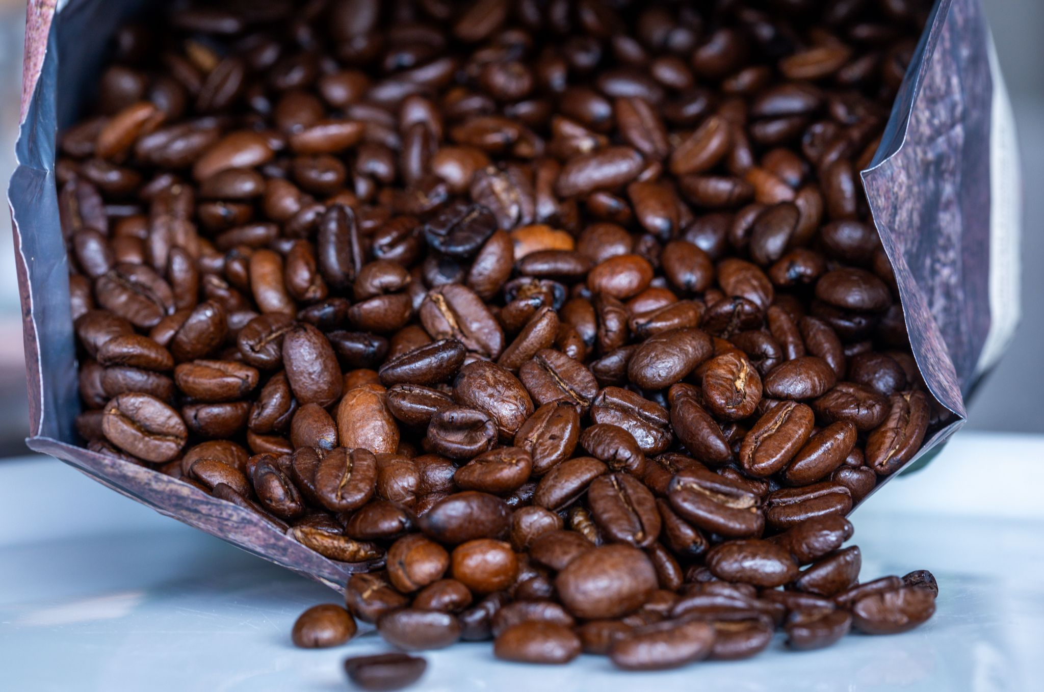 Vorwurf Kampfpreise: Tchibo verklagt Aldi Süd wegen Billig-Kaffee