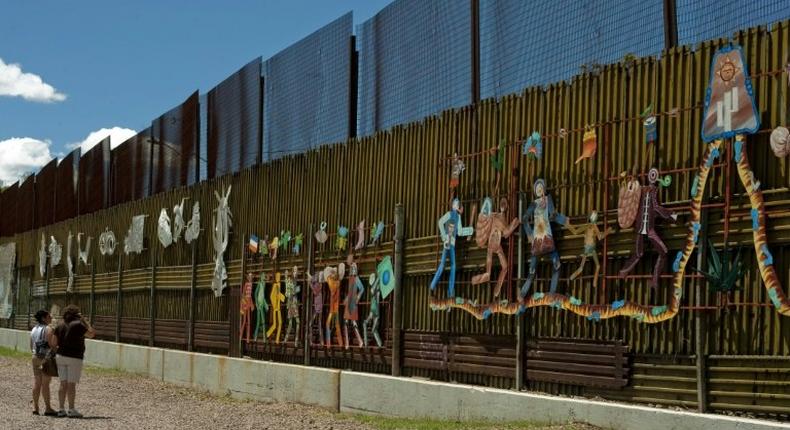 The US-Mexico border fence, seen from Nogales, Mexico's Sonora state