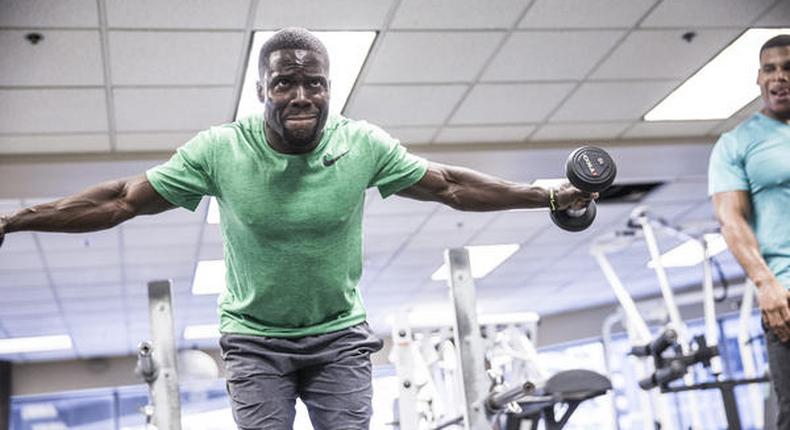 Kevin Hart working out in the gym 