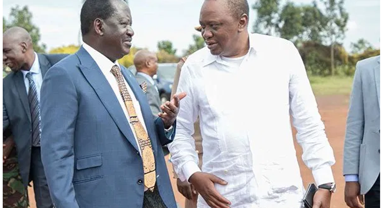 File image of President Uhuru Kenyatta with Raila Odinga