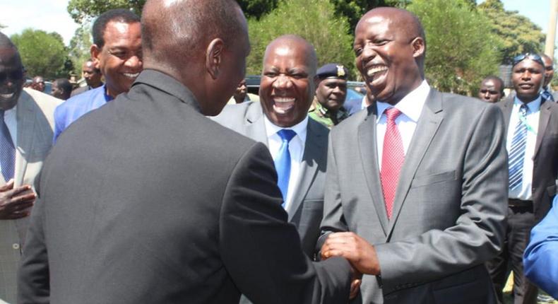 File image of Julius Melly welcoming DP Ruto at an event at Kapsabet Boys High School.