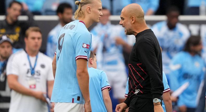 Erling Haaland and Manchester City coach Pep Guardiola