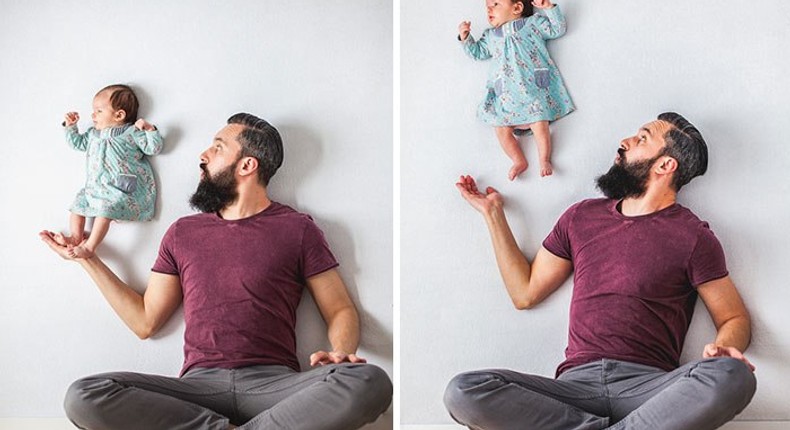 Dad plays with new born baby in candid photos