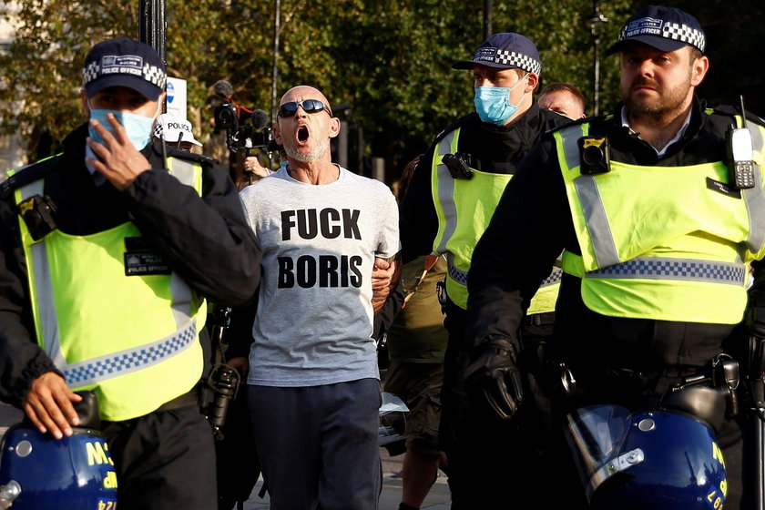 People gather in Trafalgar Square to protest against the lockdown imposed by the government, in Lond