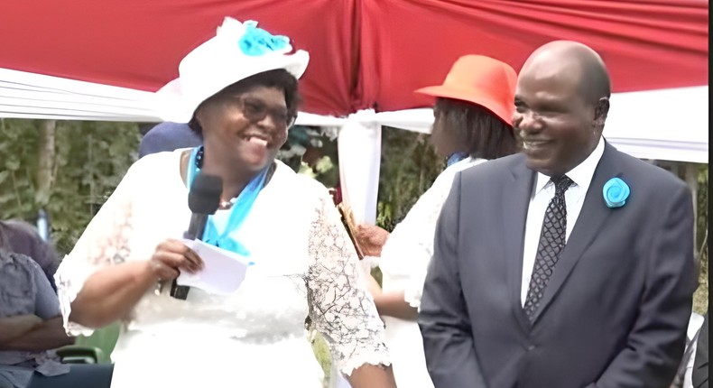 IEBC Chair Wafula Chebukati (right), his wife Mary and son Emmanuel